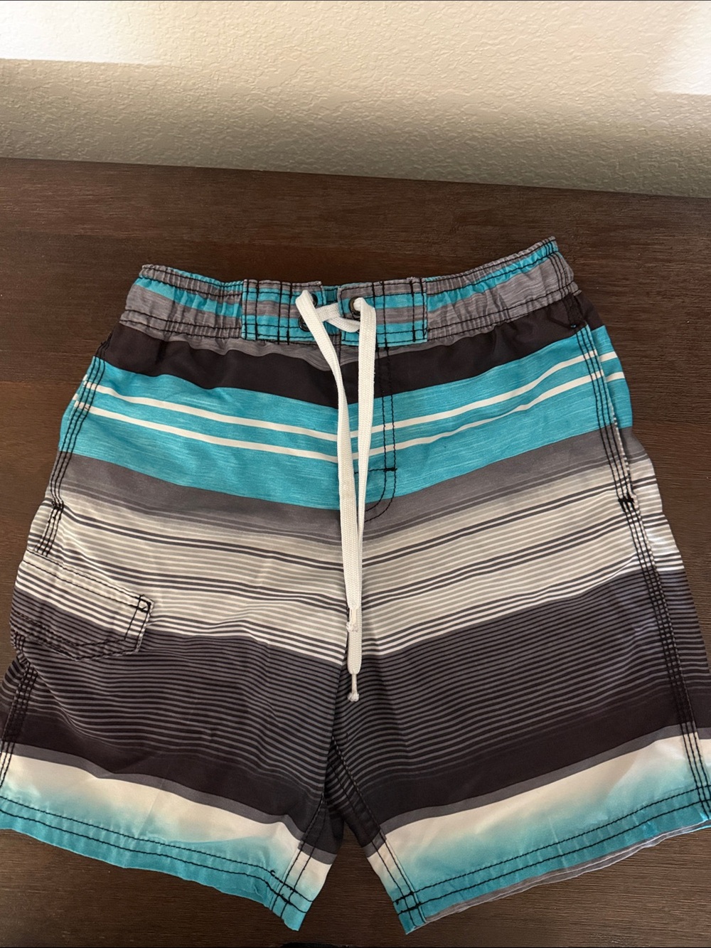 Boy’s Kanu Surf Teal & Black Striped Boys’ Swim Shorts | Medium(5-6)